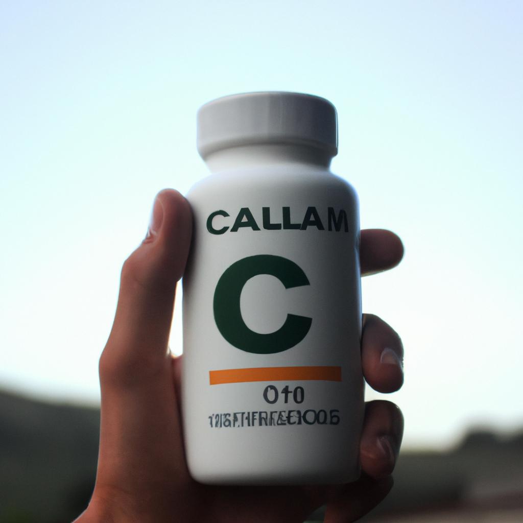 Person holding calcium supplement bottle